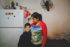 Montaha with her son  Dany in their precarious housing, Christian Iraqi refugees, Beirut, Lebanon