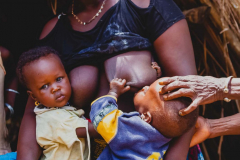 6 July 2014, mother breastfeeding her son